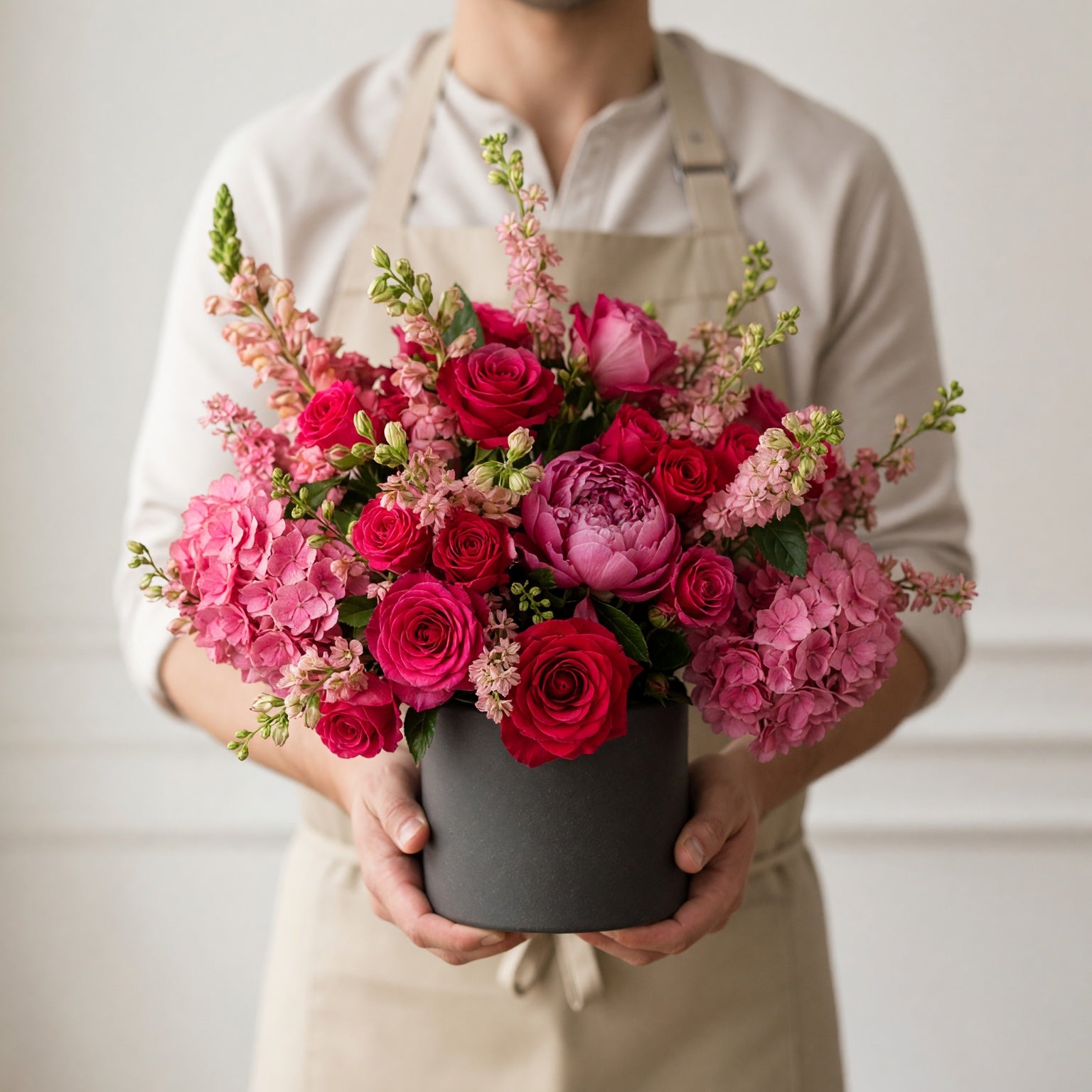 Dorchester pink rose and hydrangea arrangement styled in a contemporary London interior