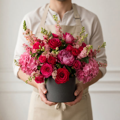 Dorchester pink rose and hydrangea arrangement styled in a contemporary London interior